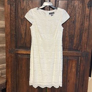 White lace dress only use once.